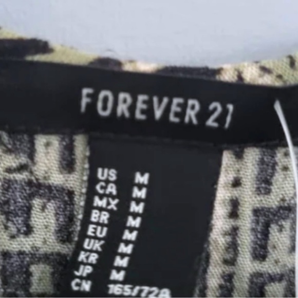 New Abstract Tribal Print Romper
Charcoal Geometric Playsuit - Picture 3 of 4